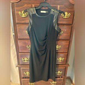 Black Calvin Klein dress with gold and leather details, size 4
